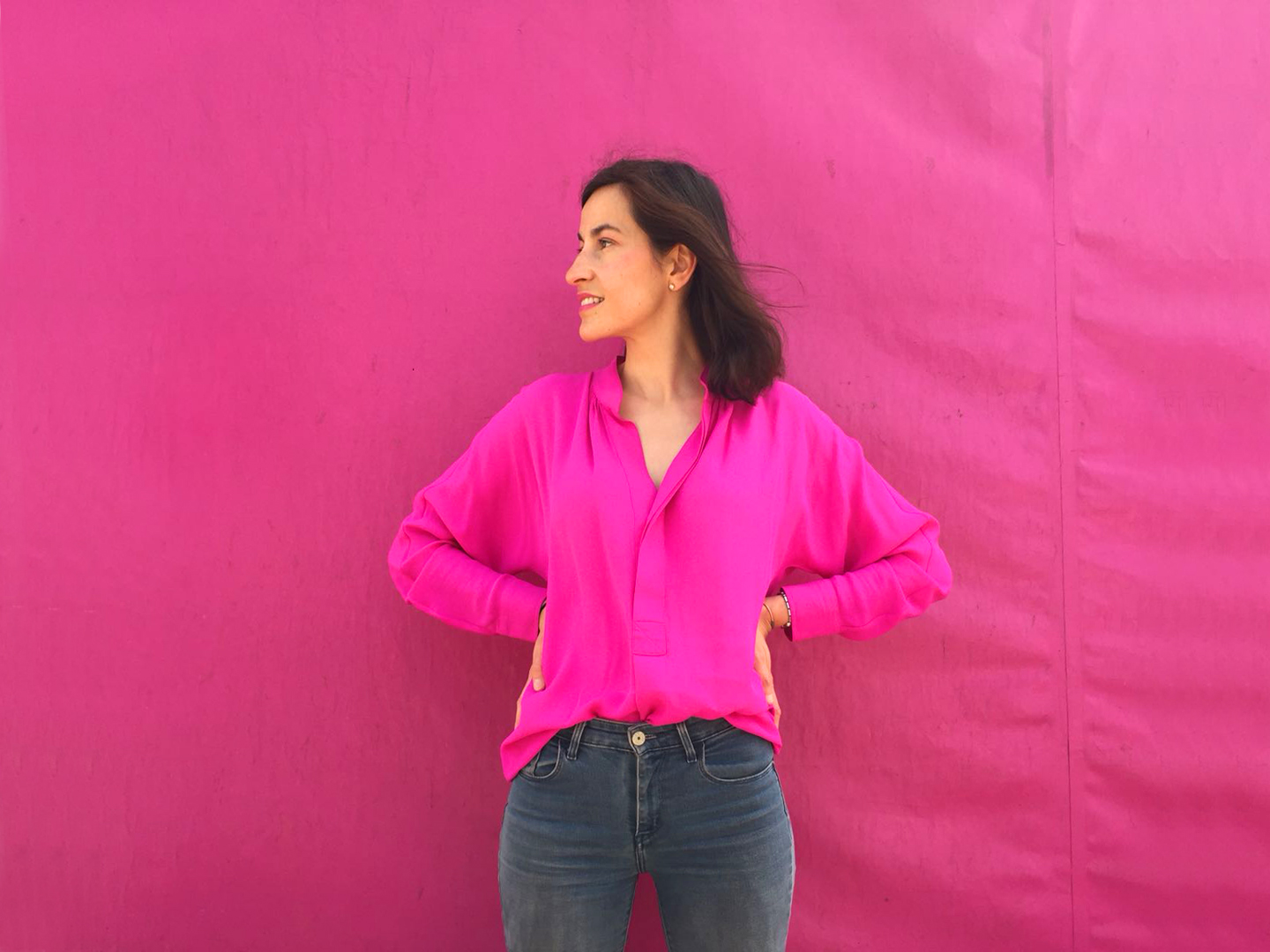 Style Indigo wearing a pink dress as a shirt to achieve the 30 wears challenge